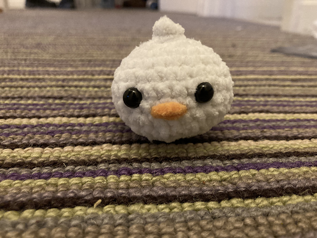 a small and rather blobular crochet duck