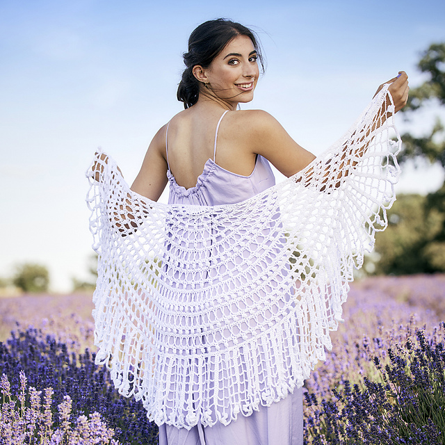 Delicate lace crochet Lavender Lace Shawl by Joanne Fowler made with fingering yarn – perfect summer accessory with openwork pattern